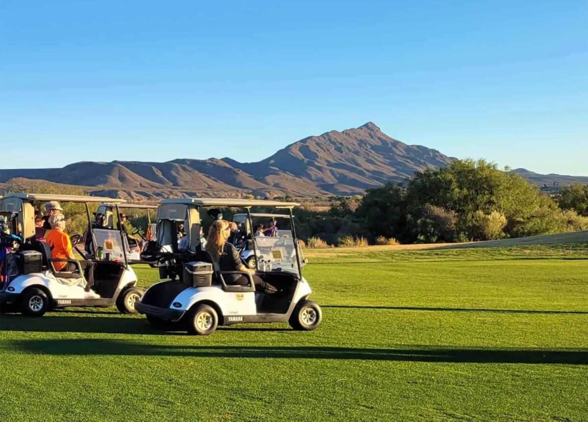 golfers on the fairway at Turtleback Mountain Golf & Resort